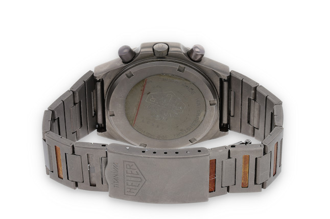 Bonhams Heuer. A Titanium Automatic Bracelet Watch with Date