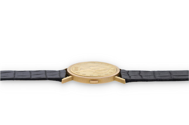 Bonhams Sarcar. An 8K Yellow Gold Coin Watch