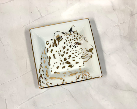 Bonhams A Hermes Cigar Dish and A Cartier Ceramic Panthere Dish