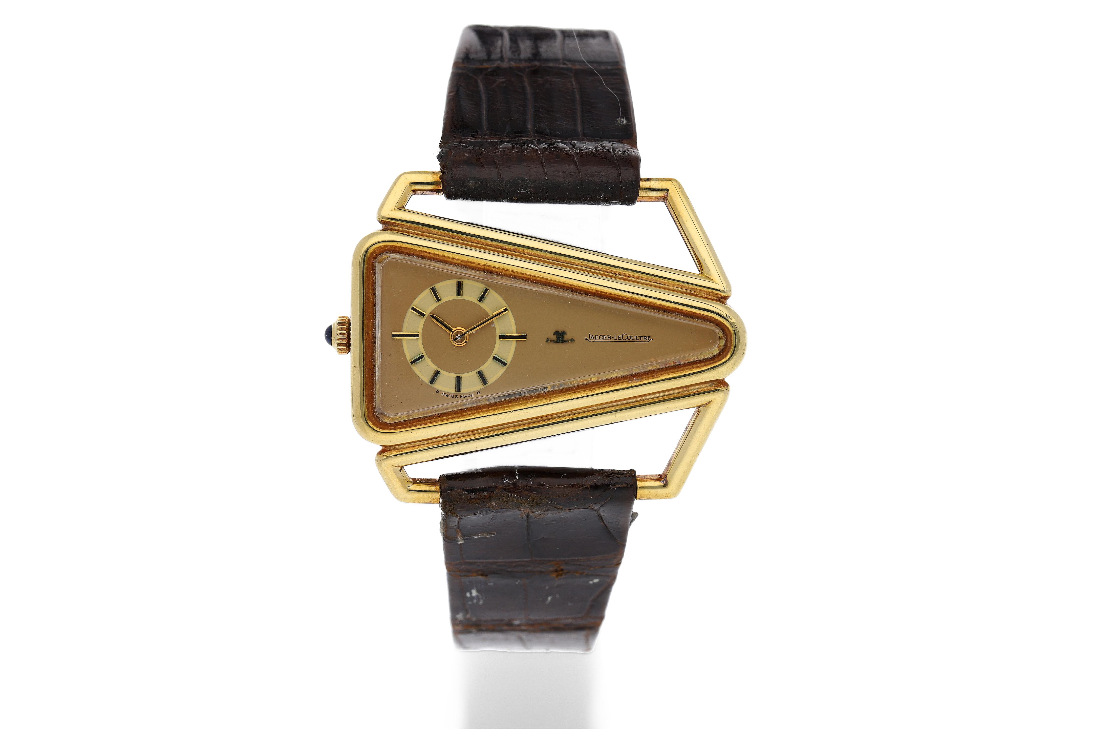 Bonhams JAEGER LECOULTRE. AN UNUSUAL ASYMMETRIC YELLOW GOLD