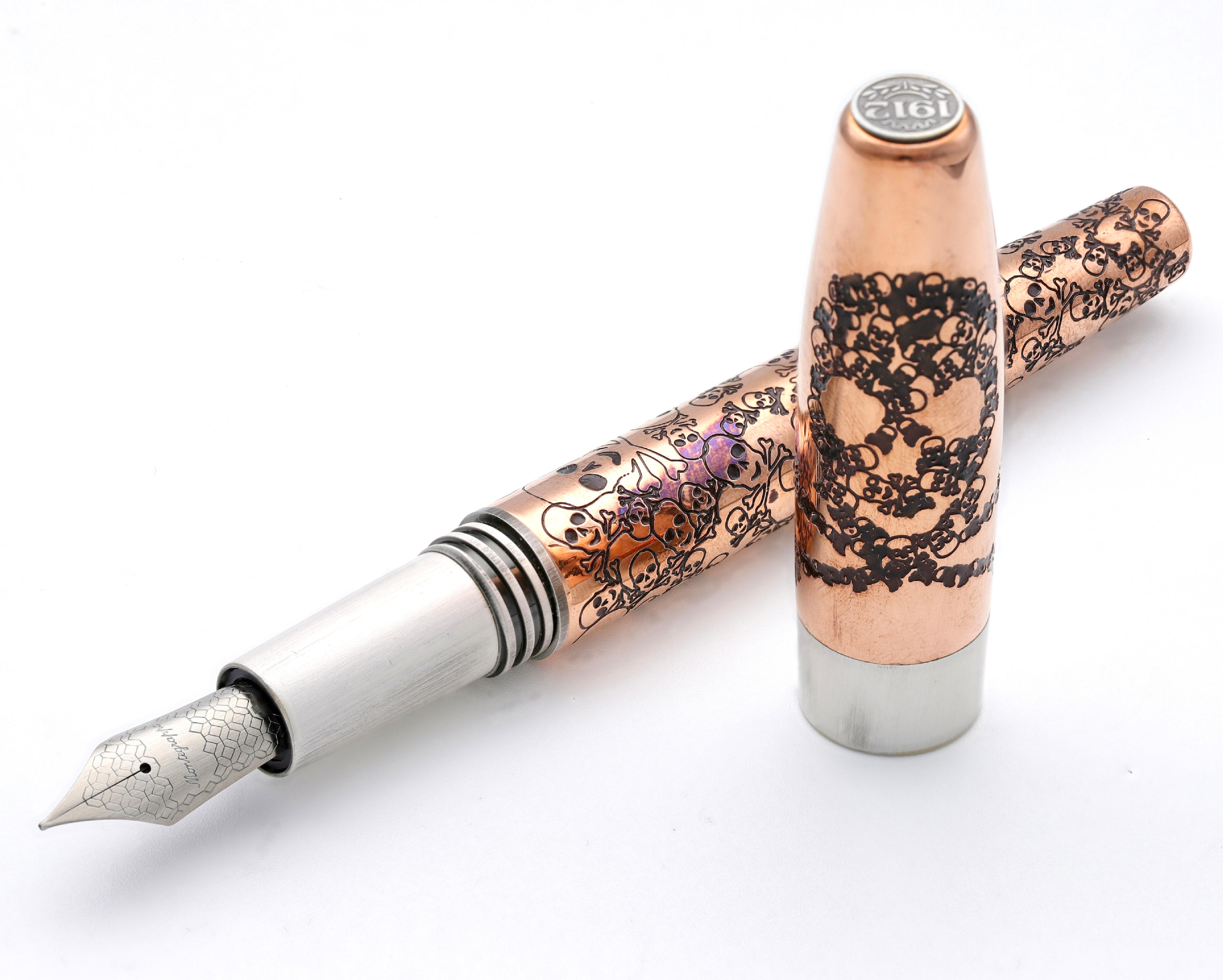 Bonhams Montegrappa. A Copper Skull Fountain Pen With Box and