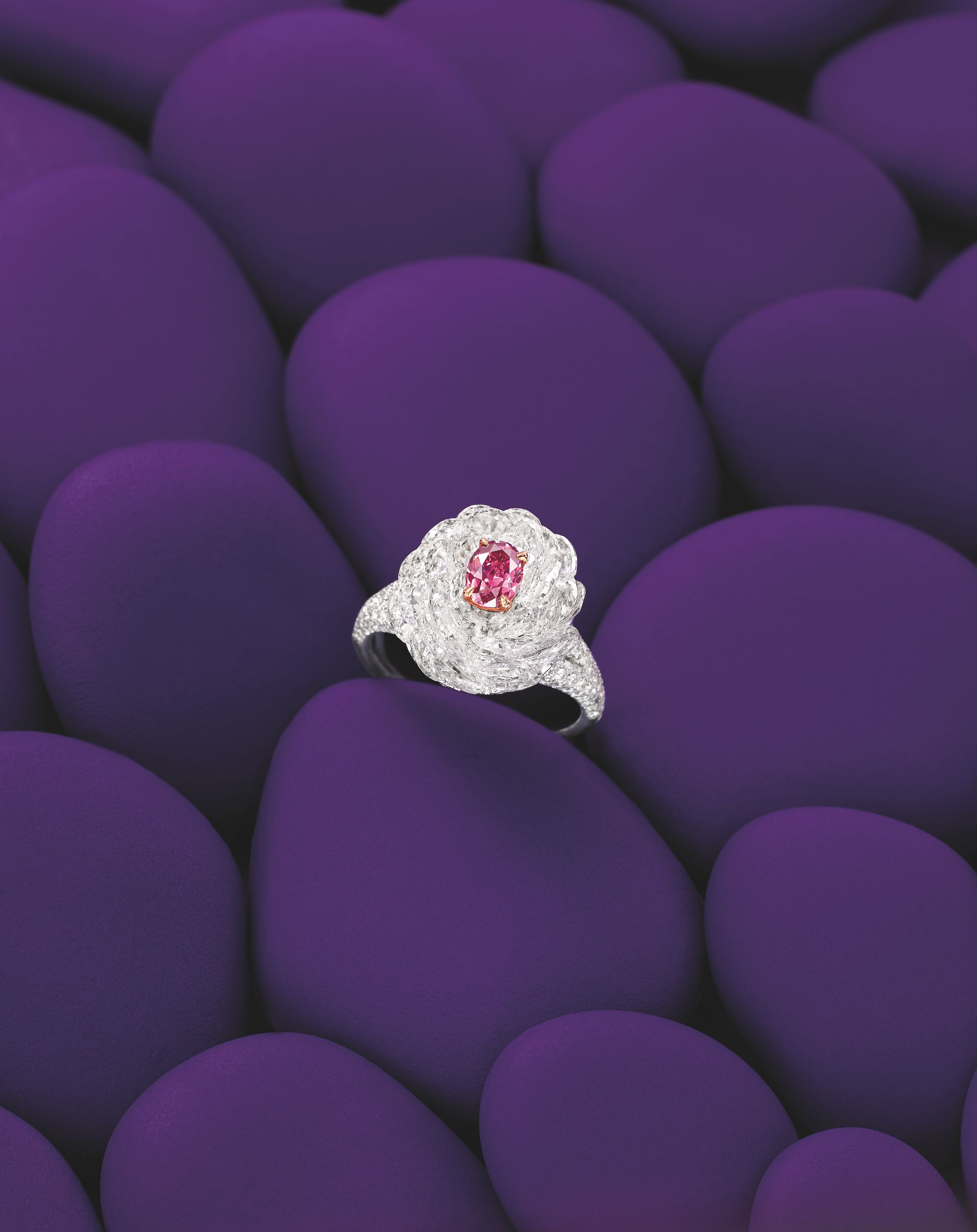 AN IMPORTANT COLOURED DIAMOND AND Bonhams