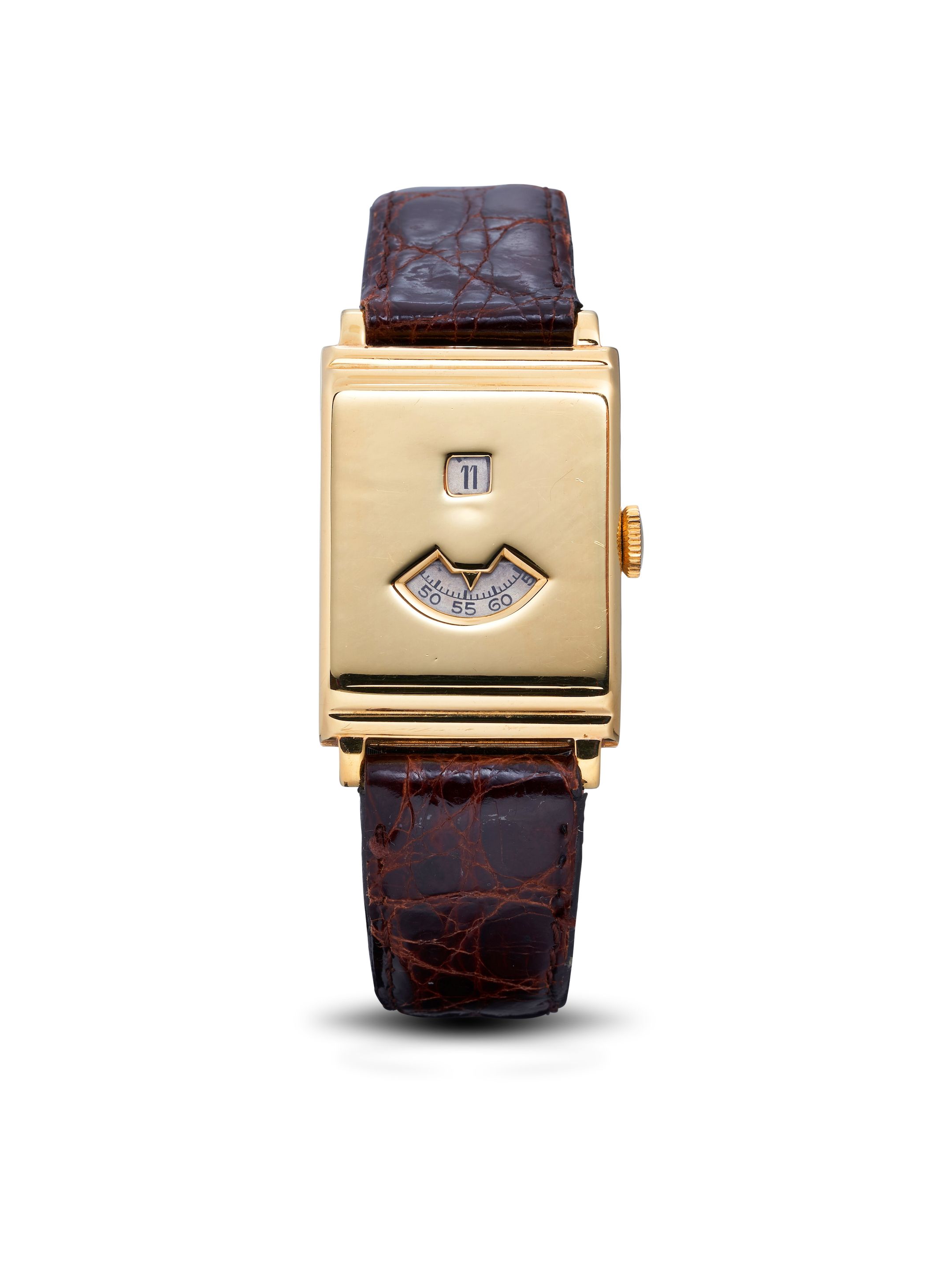 Bonhams : MOVADO | JUMP HOUR, REF. 1071, AN 18K GOLD DIGITAL JUMP 