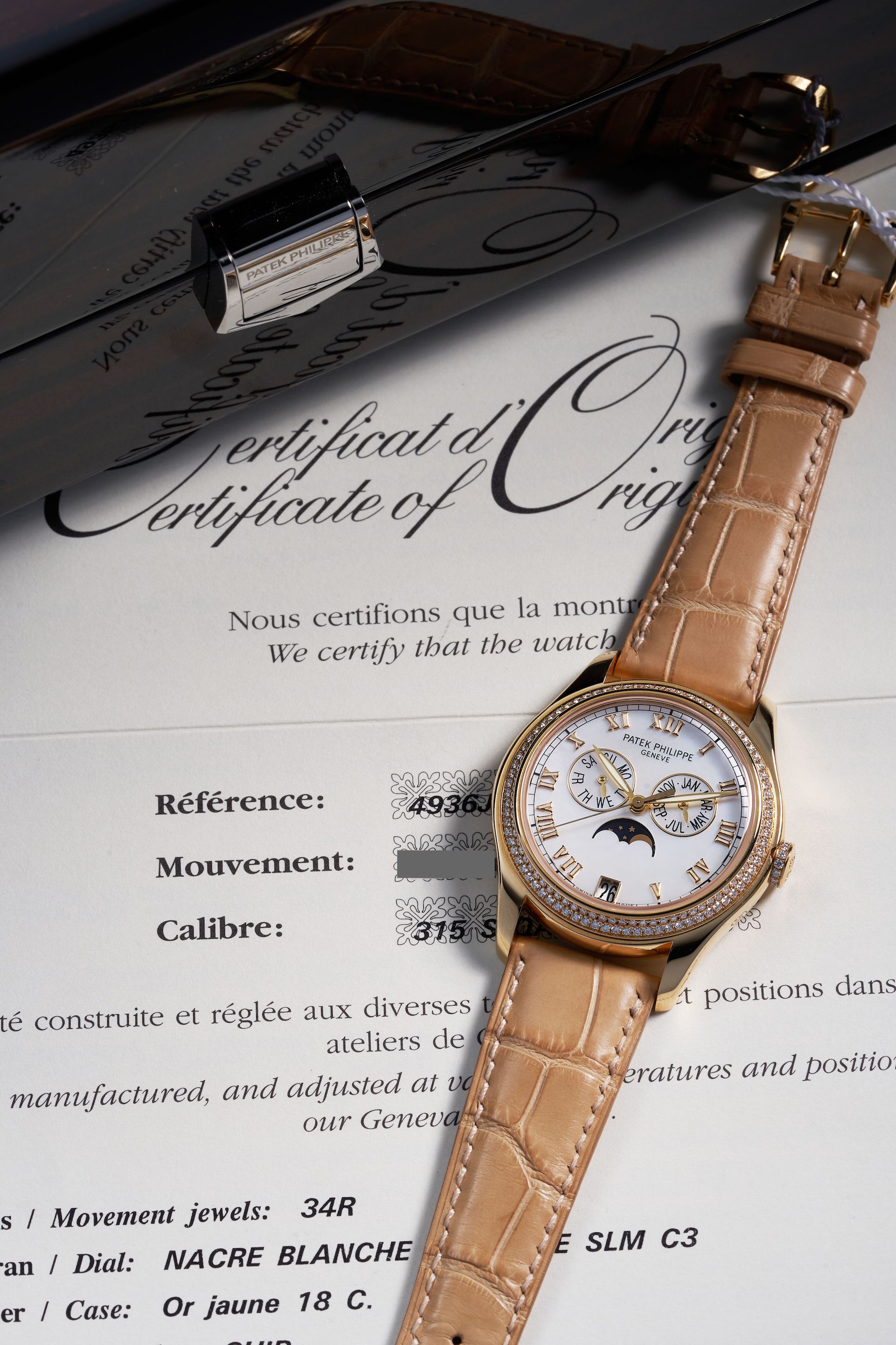 Bonhams PATEK PHILIPPE A FINE YELLOW GOLD AND