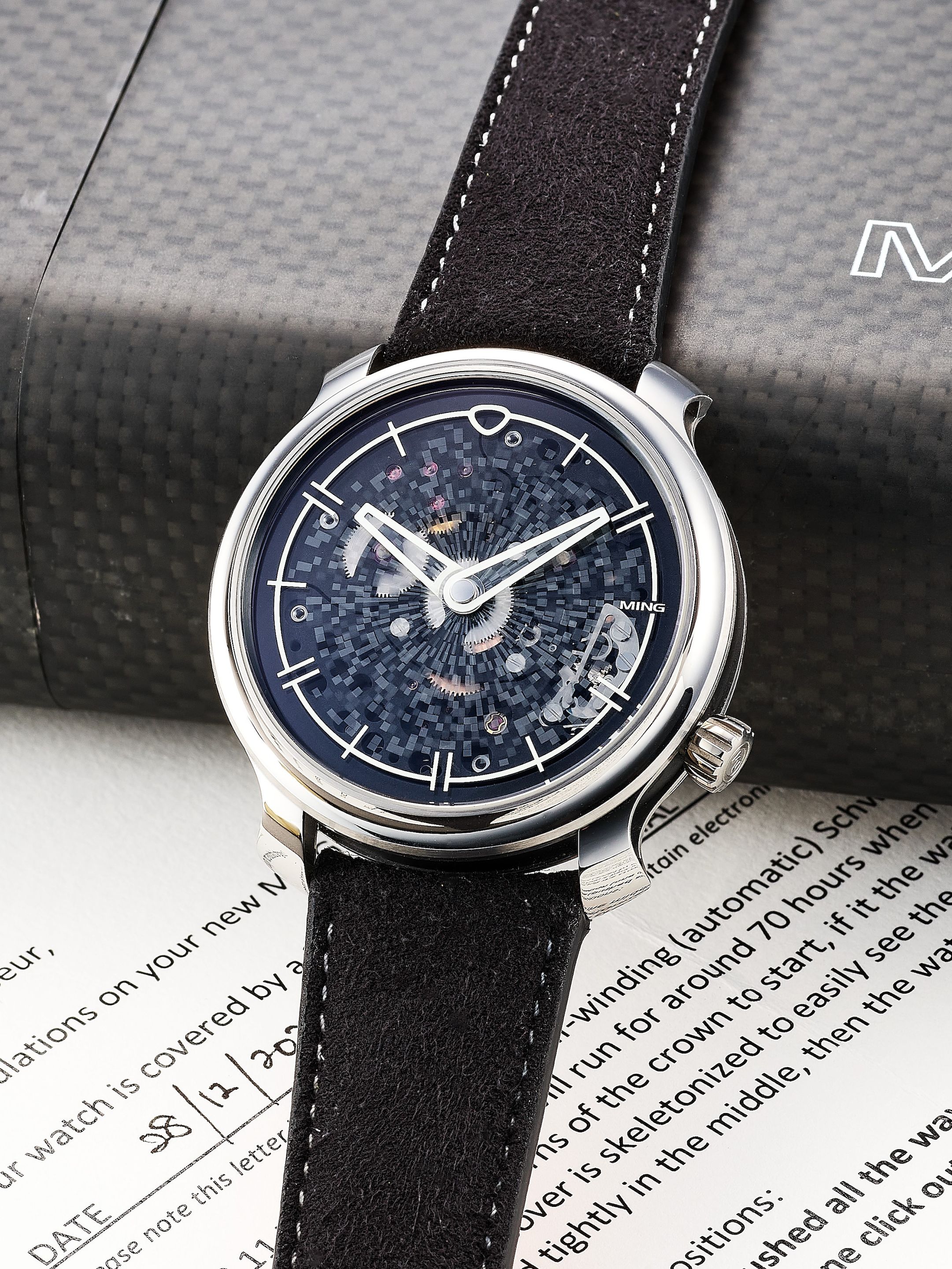 MING MOSAIC, A TITANIUM SEMI Bonhams